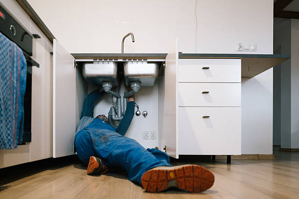 Professional Drain Cleaning technician working in West Orange, TX